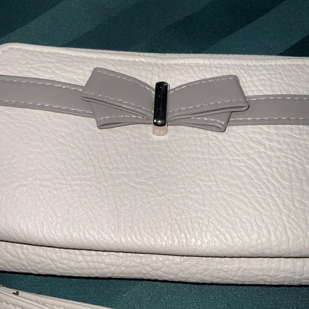 Jessica Simpson Taupe Bow Back Zip Wallet Wristlet 8” X 4.5” X 1” NWOT